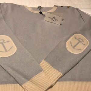 Gray blue crewneck cashmere sweater.